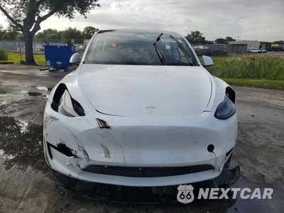 Piąte zdjęcie samochodu w środku: 2025 TESLA MODEL Y VIN:7SAYGDED3SA379548 - miniatura