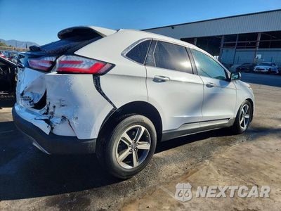 Trzecie zdjęcie samochodu z tyłu: 2020 FORD EDGE SEL VIN:2FMPK4J92LBB12407 - miniatura