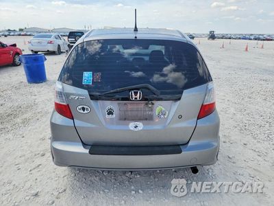 Zdjęcie 6 z 12 samochodu: 2009 HONDA FIT VIN:JHMGE88299C002179 - miniatura