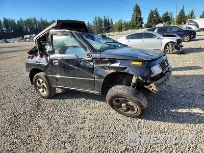 Czwarte zdjęcie samochodu z boku: 1993 GEO TRACKER VIN:2CNBJ18UXP6935073 - miniatura