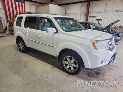 Czwarte zdjęcie samochodu z boku: 2010 HONDA PILOT TOURING VIN:5FNYF4H88AB010636 - miniatura