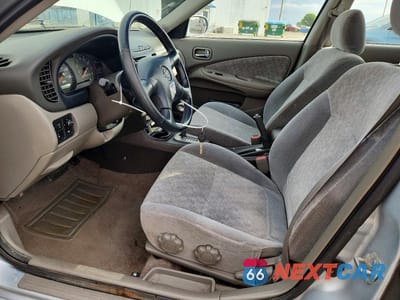 Zdjęcie 7 z 13 samochodu: 2002 NISSAN SENTRA GXE VIN:3N1CB51A52L551142 - miniatura