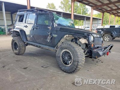 Czwarte zdjęcie samochodu z boku: 2012 JEEP WRANGLER UNLIMITED RUBICON VIN:1C4BJWFG4CL215607 - miniatura