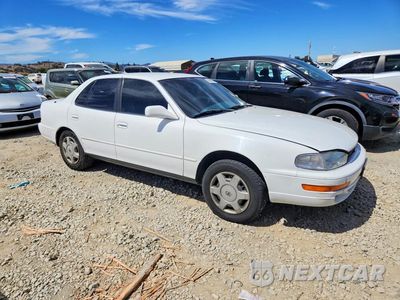 Czwarte zdjęcie samochodu z boku: 1992 TOYOTA CAMRY LE V6 VIN:4T1VK12E4NU006488 - miniatura
