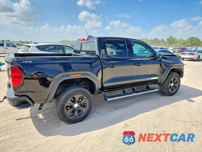 Trzecie zdjęcie samochodu z tyłu: 2024 GMC CANYON ELEVATION VIN:1GTP6BEK6R1161270 - miniatura