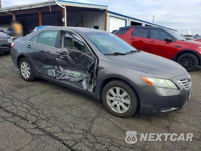 Czwarte zdjęcie samochodu z boku: 2007 TOYOTA CAMRY HYBRID VIN:JTNBB46K973029665 - miniatura
