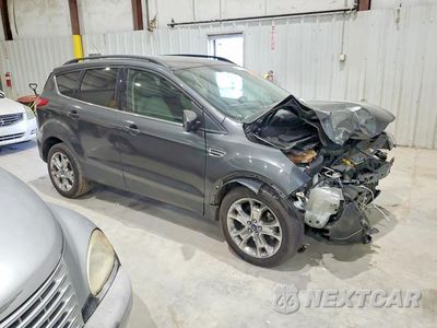 Czwarte zdjęcie samochodu z boku: 2015 FORD ESCAPE SE VIN:1FMCU0G92FUA06076 - miniatura