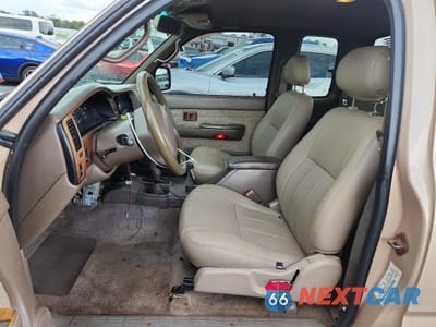 Zdjęcie 7 z 13 samochodu: 2000 TOYOTA TACOMA V6 VIN:4TAWN72N1YZ581072 - miniatura