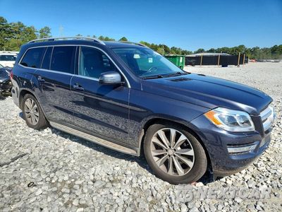 Czwarte zdjęcie samochodu z boku: 2014 MERCEDES-BENZ GL 450 4MATIC VIN:4JGDF7CE8EA328232 - miniatura