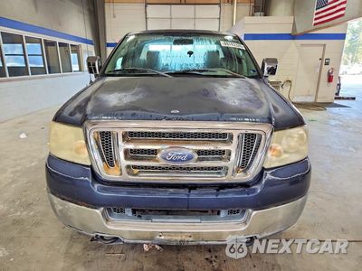 Piąte zdjęcie samochodu w środku: 2004 FORD F150 VIN:1FTVF14554NB81167 - miniatura