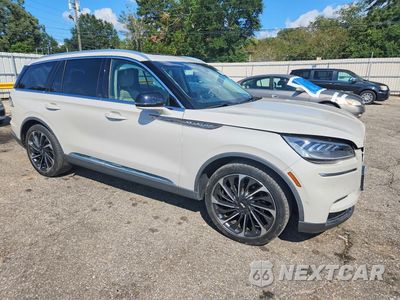 Czwarte zdjęcie samochodu z boku: 2023 LINCOLN AVIATOR RESERVE VIN:5LM5J7WC6PGL00293 - miniatura