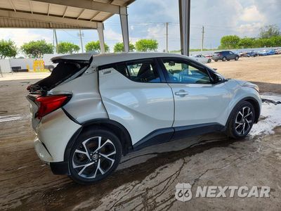 Trzecie zdjęcie samochodu z tyłu: 2021 TOYOTA C-HR XLE VIN:NMTKHMBXXMR125401 - miniatura
