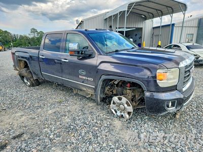 Czwarte zdjęcie samochodu z boku: 2015 GMC SIERRA K3500 SLT VIN:1GT423E88FF556641 - miniatura