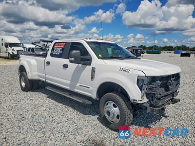 Czwarte zdjęcie samochodu z boku: 2017 FORD F350 SUPER DUTY VIN:1FT8W3DT9HEE02394 - miniatura
