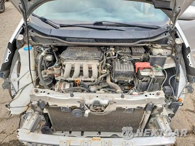 Zdjęcie 11 z 13 samochodu: 2013 HONDA FIT SPORT VIN:JHMGE8H50DC011016 - miniatura