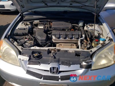 Zdjęcie 11 z 12 samochodu: 2002 HONDA CIVIC EX VIN:1HGEM22982L105776 - miniatura