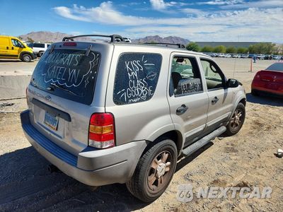 Trzecie zdjęcie samochodu z tyłu: 2001 FORD ESCAPE XLT VIN:1FMYU03181KF70924 - miniatura