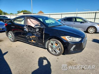 Czwarte zdjęcie samochodu z boku: 2017 HYUNDAI ELANTRA LIMITED VIN:KMHD84LF7HU170034 - miniatura