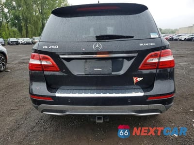 Zdjęcie 6 z 13 samochodu: 2015 MERCEDES-BENZ ML 250 BLUETEC VIN:4JGDA0EB8FA618979 - miniatura