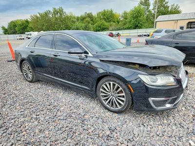 Czwarte zdjęcie samochodu z boku: 2017 LINCOLN MKZ VIN:3LN6L5C92HR602897 - miniatura