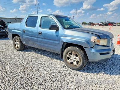 Czwarte zdjęcie samochodu z boku: 2006 HONDA RIDGELINE RT VIN:2HJYK16226H559299 - miniatura
