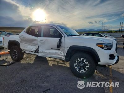 Czwarte zdjęcie samochodu z boku: 2023 TOYOTA TACOMA TRD OFF-ROAD VIN:3TMCZ5AN0PM612992 - miniatura