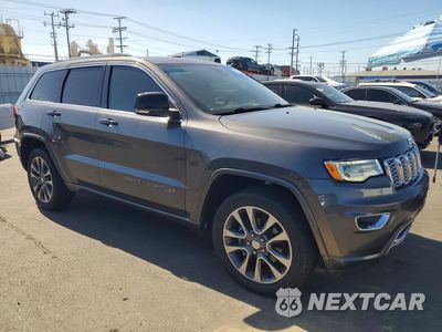 Czwarte zdjęcie samochodu z boku: 2017 JEEP GRAND CHEROKEE OVERLAND VIN:1C4RJFCG4HC920076 - miniatura
