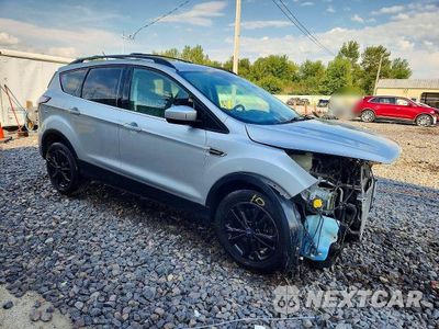 Czwarte zdjęcie samochodu z boku: 2018 FORD ESCAPE SEL VIN:1FMCU9HD9JUA40063 - miniatura