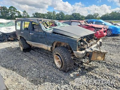 Czwarte zdjęcie samochodu z boku: 1992 JEEP CHEROKEE LAREDO VIN:1J4FJ58S3NL248575 - miniatura