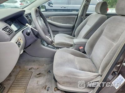 Zdjęcie 7 z 12 samochodu: 2004 TOYOTA COROLLA CE VIN:2T1BR32E14C181128 - miniatura