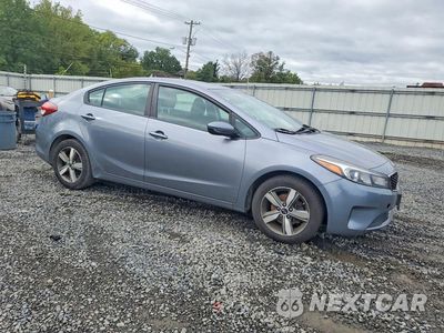 Czwarte zdjęcie samochodu z boku: 2018 KIA FORTE S VIN:3KPFL4A73JE170950 - miniatura