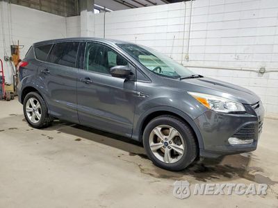 Czwarte zdjęcie samochodu z boku: 2015 FORD ESCAPE SE VIN:1FMCU9GX2FUB40489 - miniatura