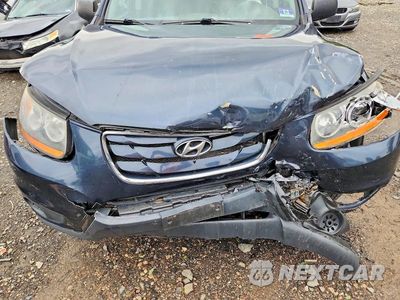 Zdjęcie 11 z 12 samochodu: 2011 HYUNDAI SANTA FE GLS VIN:5XYZGDAB1BG073840 - miniatura