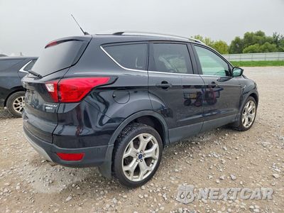 Trzecie zdjęcie samochodu z tyłu: 2019 FORD ESCAPE TITANIUM VIN:1FMCU9J99KUC48211 - miniatura
