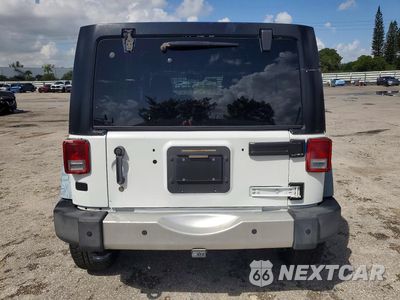 Zdjęcie 6 z 13 samochodu: 2014 JEEP WRANGLER UNLIMITED SAHARA VIN:1C4BJWEG0EL206987 - miniatura