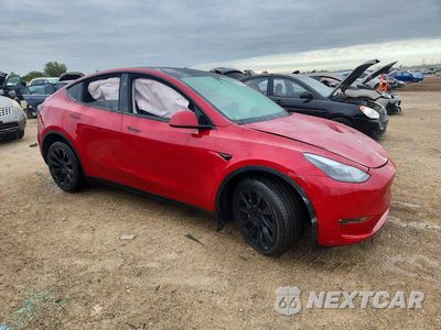Czwarte zdjęcie samochodu z boku: 2023 TESLA MODEL Y VIN:7SAYGAEE6PF865191 - miniatura
