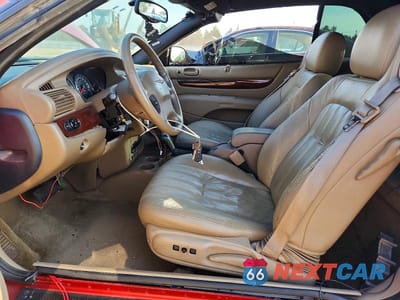 Zdjęcie 7 z 12 samochodu: 2002 CHRYSLER SEBRING LXI VIN:1C3EL55R42N181826 - miniatura