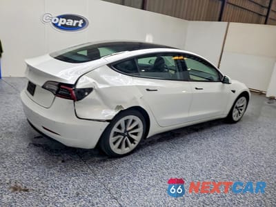 Trzecie zdjęcie samochodu z tyłu: 2022 TESLA MODEL 3 VIN:5YJ3E1EA2NF371126 - miniatura