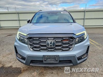 Piąte zdjęcie samochodu w środku: 2022 HONDA PASSPORT TRAIL SPORT VIN:5FNYF8H68NB000510 - miniatura