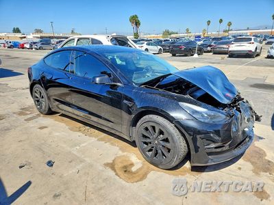 Czwarte zdjęcie samochodu z boku: 2022 TESLA MODEL 3 VIN:5YJ3E1EB1NF287274 - miniatura