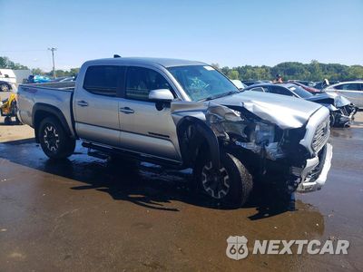 Czwarte zdjęcie samochodu z boku: 2023 TOYOTA TACOMA TRD OFF-ROAD VIN:3TMCZ5AN4PM557186 - miniatura