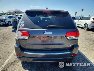 Zdjęcie 6 z 14 samochodu: 2014 JEEP GRAND CHEROKEE OVERLAND VIN:1C4RJECM1EC581448 - miniatura