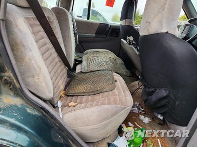 Zdjęcie 11 z 13 samochodu: 1994 JEEP GRAND CHEROKEE LAREDO VIN:1J4GZ58Y8RC270076 - miniatura