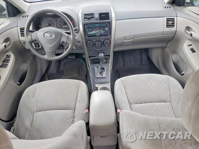 Zdjęcie 8 z 12 samochodu: 2009 TOYOTA COROLLA LE VIN:JTDBL40E099055771 - miniatura