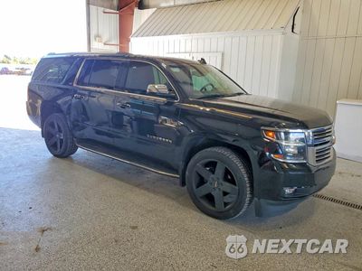 Czwarte zdjęcie samochodu z boku: 2016 CHEVROLET SUBURBAN K1500 LTZ VIN:1GNSKJKC6GR315365 - miniatura