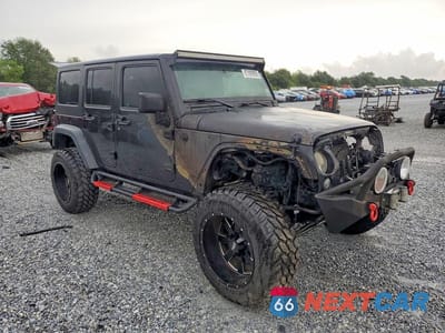 Czwarte zdjęcie samochodu z boku: 2015 JEEP WRANGLER UNLIMITED SPORT VIN:1C4BJWDG1FL503169 - miniatura