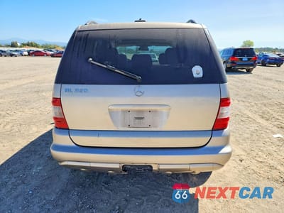 Zdjęcie 6 z 12 samochodu: 2002 MERCEDES-BENZ ML 320 VIN:4JGAB54E42A290351 - miniatura