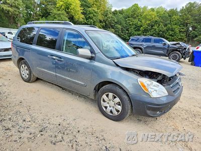 Czwarte zdjęcie samochodu z boku: 2007 HYUNDAI ENTOURAGE GLS VIN:KNDMC233X76036697 - miniatura