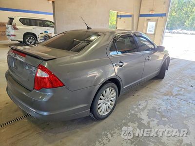 Trzecie zdjęcie samochodu z tyłu: 2012 FORD FUSION HYBRID VIN:3FADP0L33CR388936 - miniatura