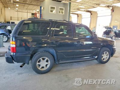 Trzecie zdjęcie samochodu z tyłu: 2003 GMC YUKON DENALI VIN:1GKEK63U93J322771 - miniatura